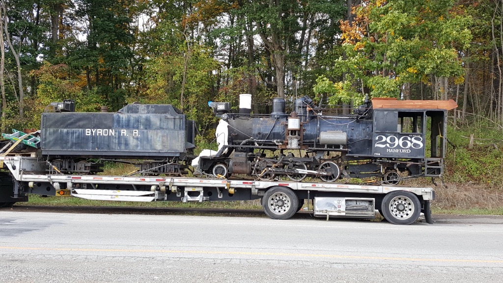 Byron RR loco on truck at I-70 rest stop 10-13-2017.jpg