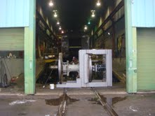 261 shop east end with driver and wheel press.jpg