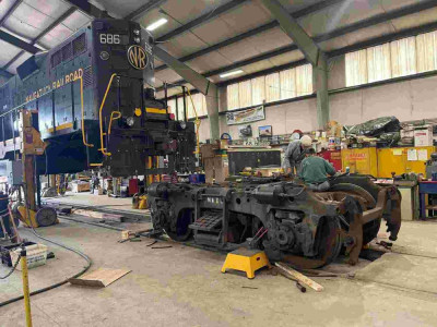 686 on jacks in shop 3-15-24 rear truck out lo res.jpg