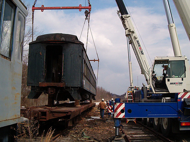 Loading CNJ coach on flat car March 2006 Alan Maples photo.jpg