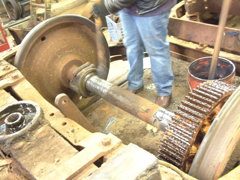 small3858 Applying grease to the axle bearing surfaces to prevent further oxidation while axles are bare.jpg